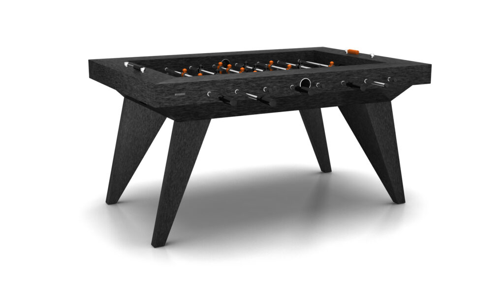 The Trigon Foosball Table features a modern design with angled legs, metal rods, and small orange and black player figures, displayed against a white background.