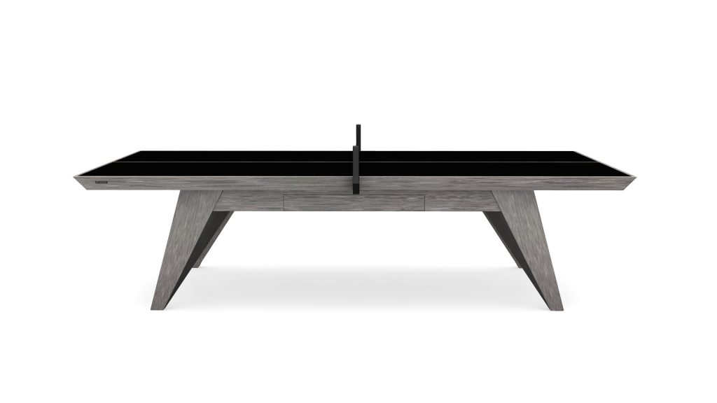 Discover the Trigon Ping Pong Table, featuring a black tabletop and gray wooden legs. Its minimalist net and angled design create a modern look, perfect for enhancing your game room with style.
