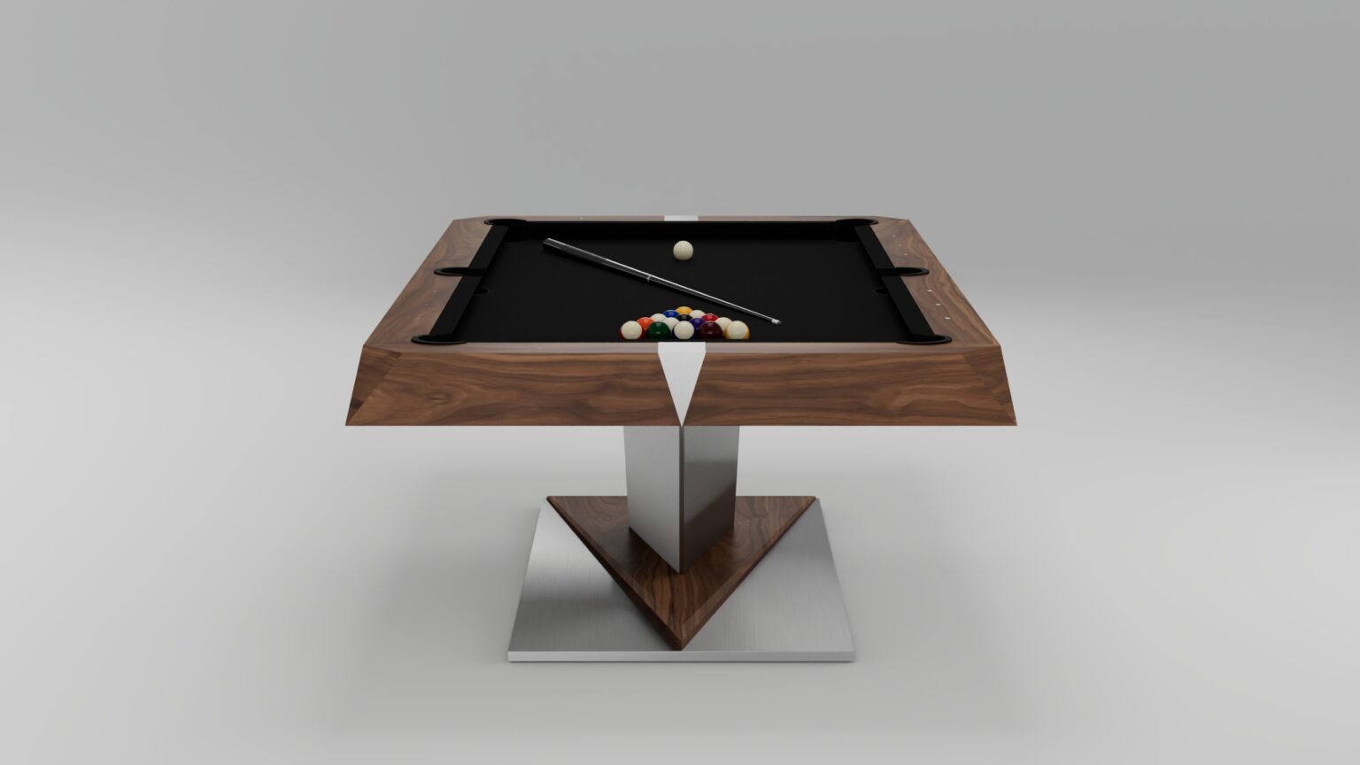 The Mitchell Pool Table features a sleek black playing surface, wooden edges, and a stainless-steel base. It comes with a cue stick, cue ball, and a triangle rack of colorful balls arranged for play.