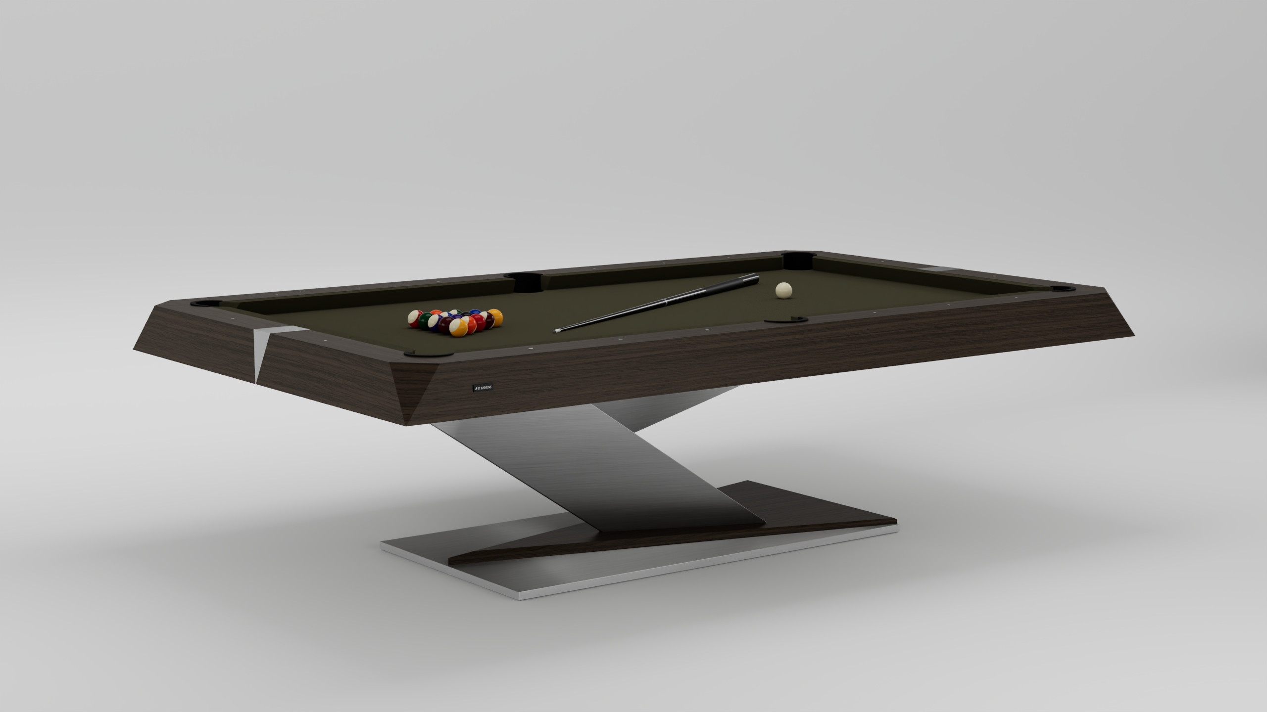 The Mitchell Pool Table features a sleek dark wood finish and an angular metal base, complete with a cue stick, cue ball, and racked billiard balls on the felt surface, all set against a plain background.