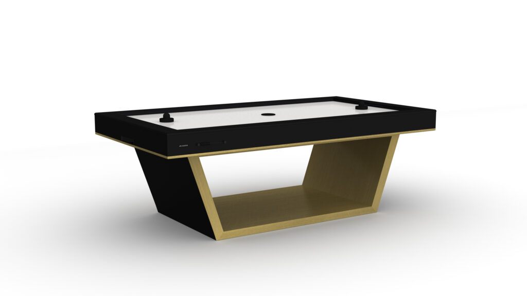 The Mesa Air Hockey Table features a modern black and gold geometric base, a rectangular playing surface, two paddles, and a center puck drop, shown against a white background.