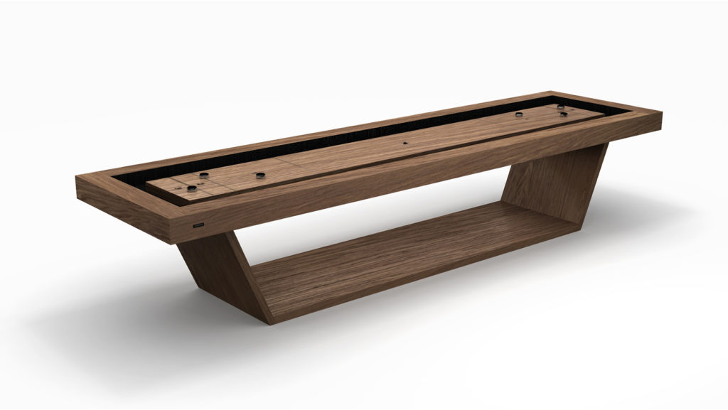 The Mesa Shuffleboard Table is a sleek, modern piece crafted from fine wood, featuring a minimalist design. It has a rectangular play surface with black pucks and a sturdy angular base, all highlighted against a plain white background to showcase its exceptional craftsmanship.