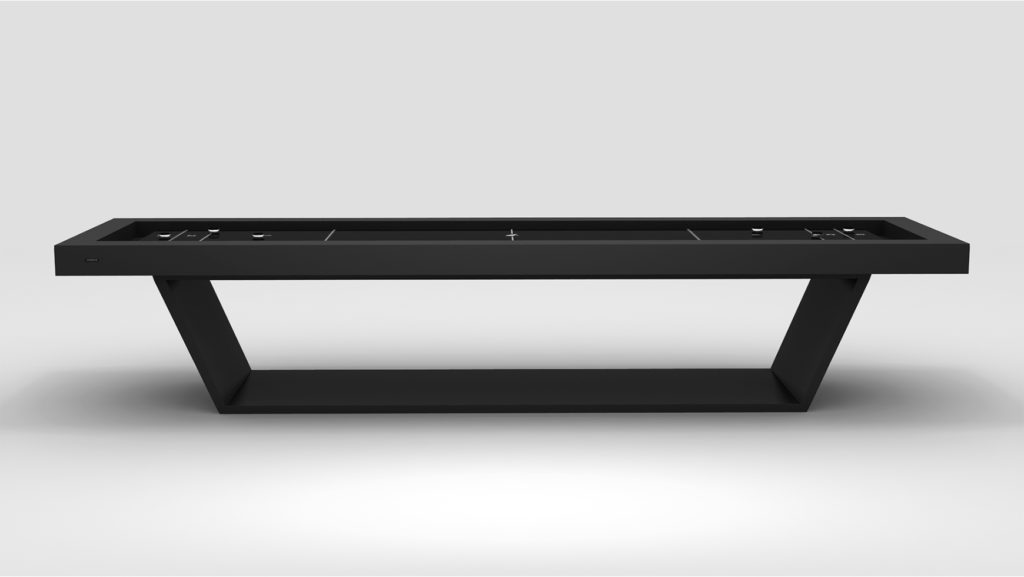 The Mesa Shuffleboard Table features a sleek, modern design with a dark rectangular surface, angular supports, and integrated storage, perfect for multi-purpose use. This minimalist piece stands out against a plain light gray background.