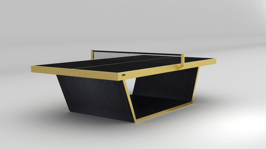 The Mesa Ping Pong Table is a modern, stylish luxury game table with a sleek black surface and yellow border. It features a unique trapezoidal base designed for minimalistic, well-lit indoor settings.