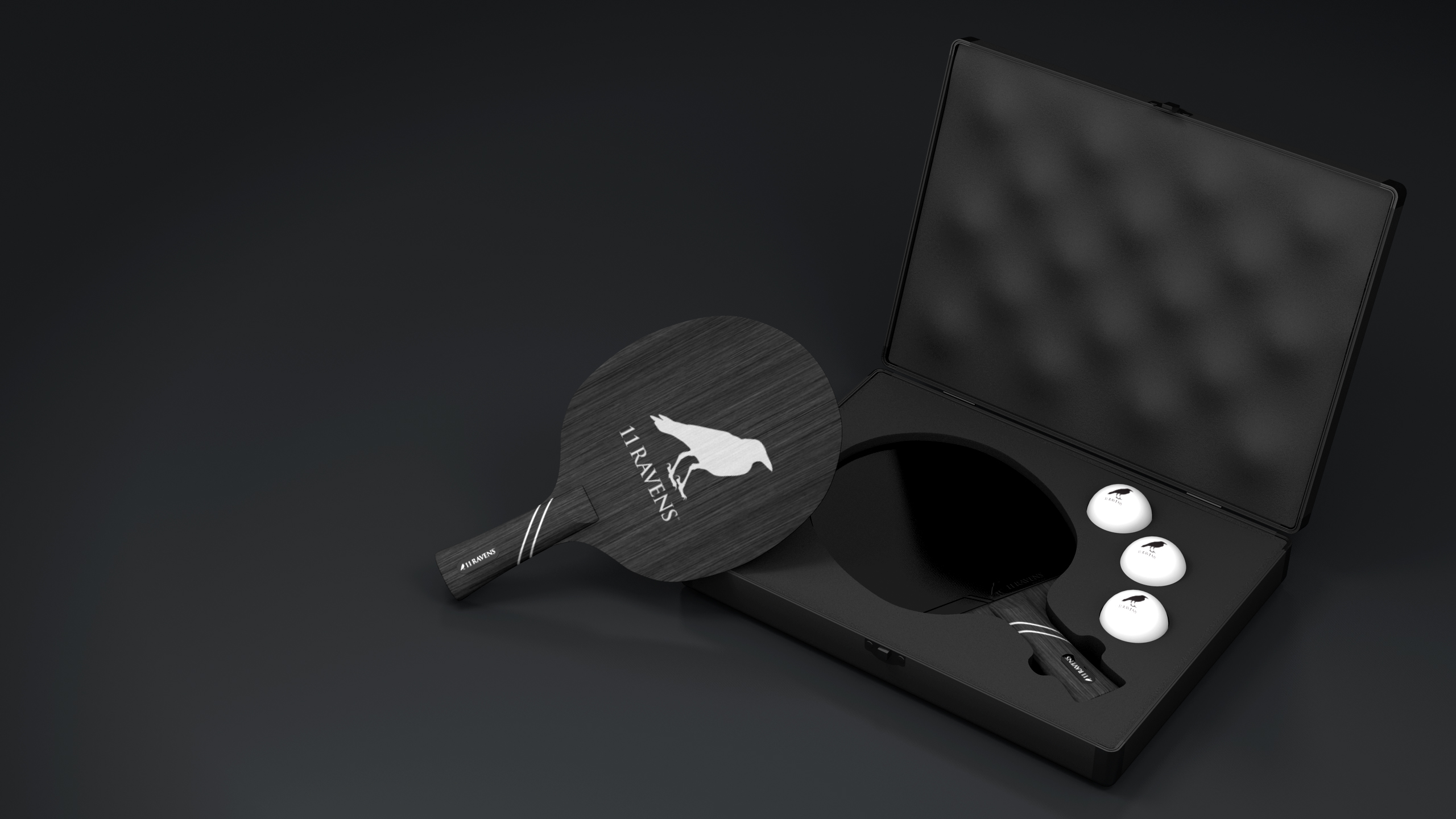 The Ping Pong Case is a black table tennis set with a paddle featuring a white raven logo and “RAVENS,” three white balls, and a foam-padded Luxury Ping Pong Case with compartments for each item, offering secure and stylish storage.