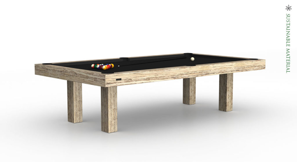 The Malibu Hemp Pool Table features a black surface and wooden frame with billiard balls arranged in a triangle. Crafted from sustainable hemp, Sustainable Material runs vertically on the right side of the image.