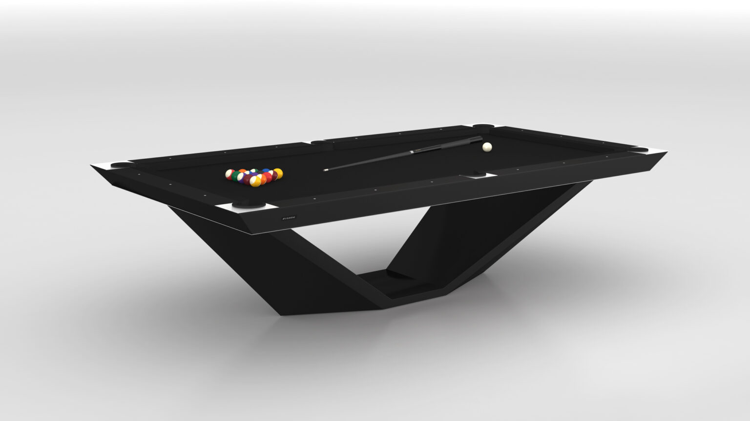 The Stealth Pool Table, with its modern black design and unique V-shaped base, epitomizes luxury. It is ready for a match with colorful billiard balls in a triangle and a cue stick beside the white cue ball on its elegant surface.