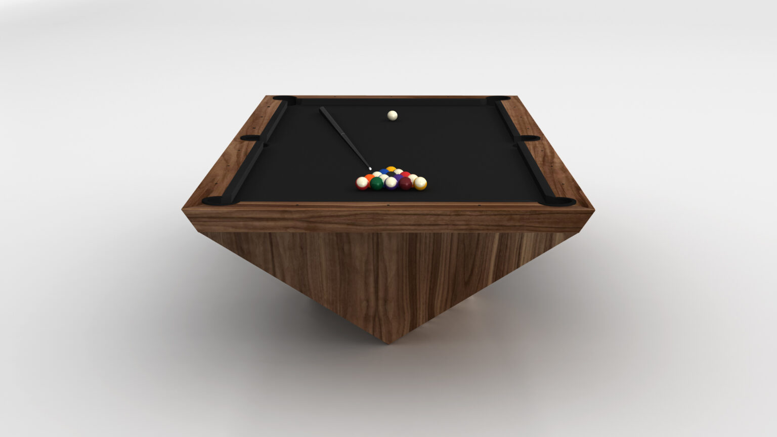 The Stealth Pool Table, a modern wooden pyramid-shaped piece with black felt, exudes luxury. A triangle of billiard balls is arranged at one end, while a cue stick rests across it against a plain white gradient backdrop.