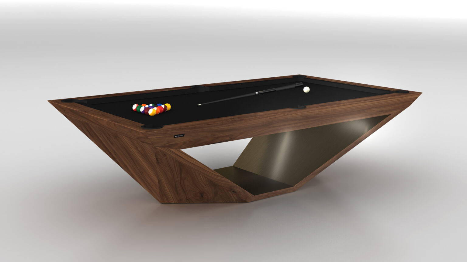 The Stealth Pool Table boasts a modern design with a sleek geometric wooden frame and black felt, exuding luxury. A set of pool balls is arranged in a triangle, and a cue stick rests across the table, all highlighted by its angular open base.