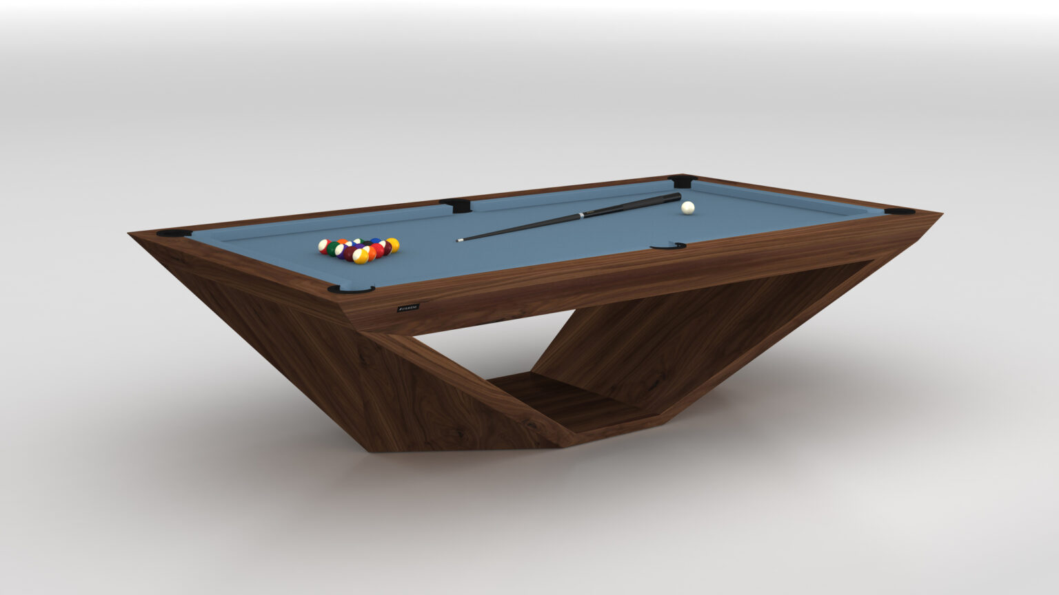 The Stealth Pool Table, a luxury game table with a wooden geometric base and blue surface, showcases colorful pool balls at one end. A cue stick and white ball are nearby, all set against a plain light gray background.