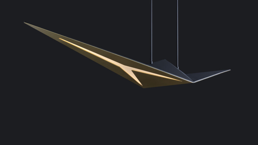 The Áves Pendant Light is a modern, minimalist ceiling fixture with sharp, angular shapes in black and gold tones, evoking the sophistication of luxury game tables, and is suspended by thin wires against a dark background.