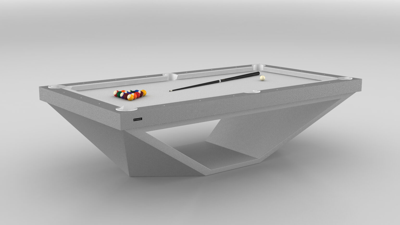 The Stealth Pool Table - Outdoor, featuring a sleek geometric base design, stands in a minimalistic space epitomizing luxury. This modern table showcases a billiard cue, a white cue ball, and an orderly set of colored balls.