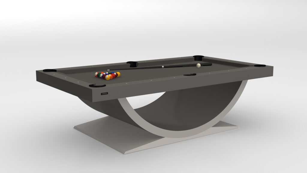 The Theseus Pool Table - Outdoor features a minimalist, elegant design with a unique curved base in gray. This luxury game table includes a rack of balls at one end and a cue stick on the surface, epitomizing sophistication for any setting.