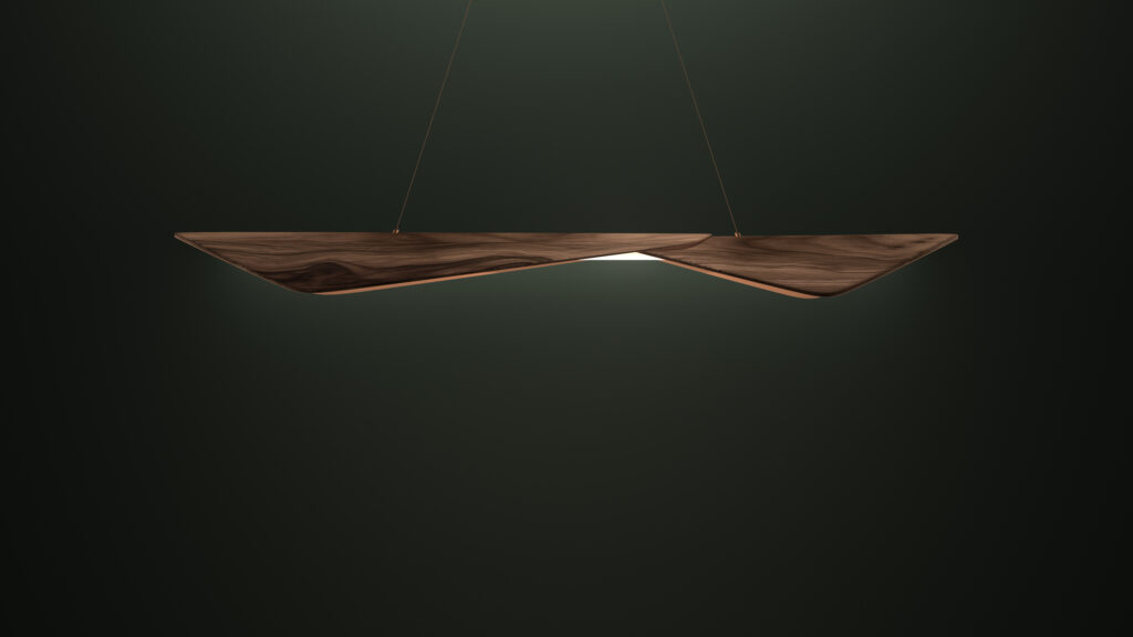 The Folio Pendant Light, crafted with dark wood, hangs against a dark green backdrop. Its modern, geometric design resembles luxury game tables, featuring two elongated wooden elements with a warm glow emanating from the center.