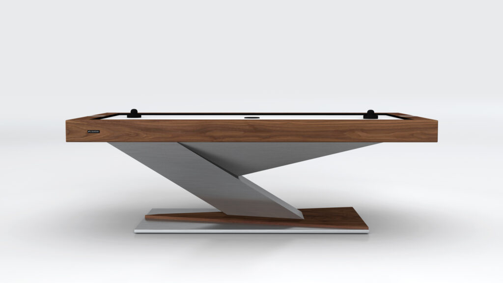 The Mitchell Air Hockey Table is a modern, minimalist piece with a sleek luxury design, featuring a geometric asymmetrical base made of wood and metal. Its elegant, contemporary look makes it perfect even as a luxury game table.