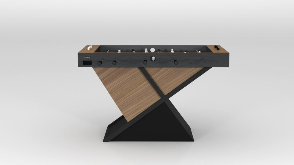The Macan Foosball Table features a sleek, geometric design with a wooden X-shaped base, dark playing surface and handles, and silver player figures on a plain white backdrop—a luxurious choice for those seeking upscale game tables.
