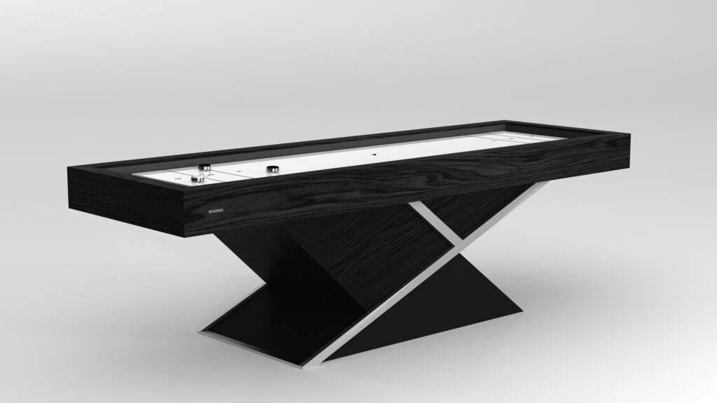 The Macan Shuffleboard Table is a luxury game table featuring a sleek black wood finish and a silver X-shaped base. With a white playing surface detailed with pucks and scoring lines, it stands against a gray background for an elegant touch.