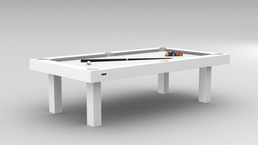 The Malibu Pool Table - Quick Ship is a modern luxury piece, set against a plain gray background. It boasts a sleek white design with four legs, complemented by a nearby cue stick and vibrant colored balls near the pocket, epitomizing sophisticated recreational elegance.