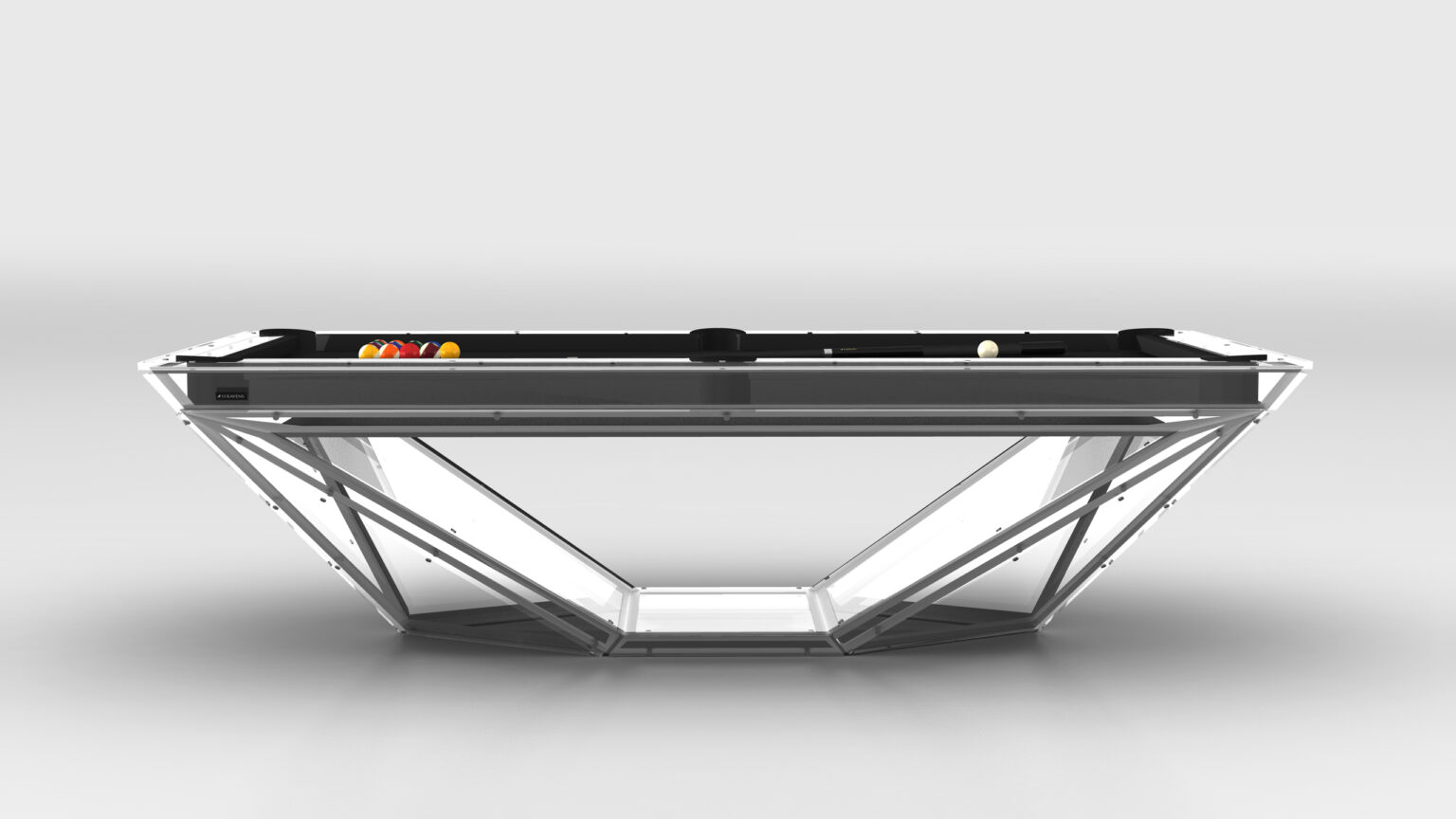 The Stealth Lucite Pool Table is a luxurious modern piece featuring a transparent geometric base and sleek black surface, with pool balls arranged for the next shot. This minimalist luxury table stands out against a plain light gray background.