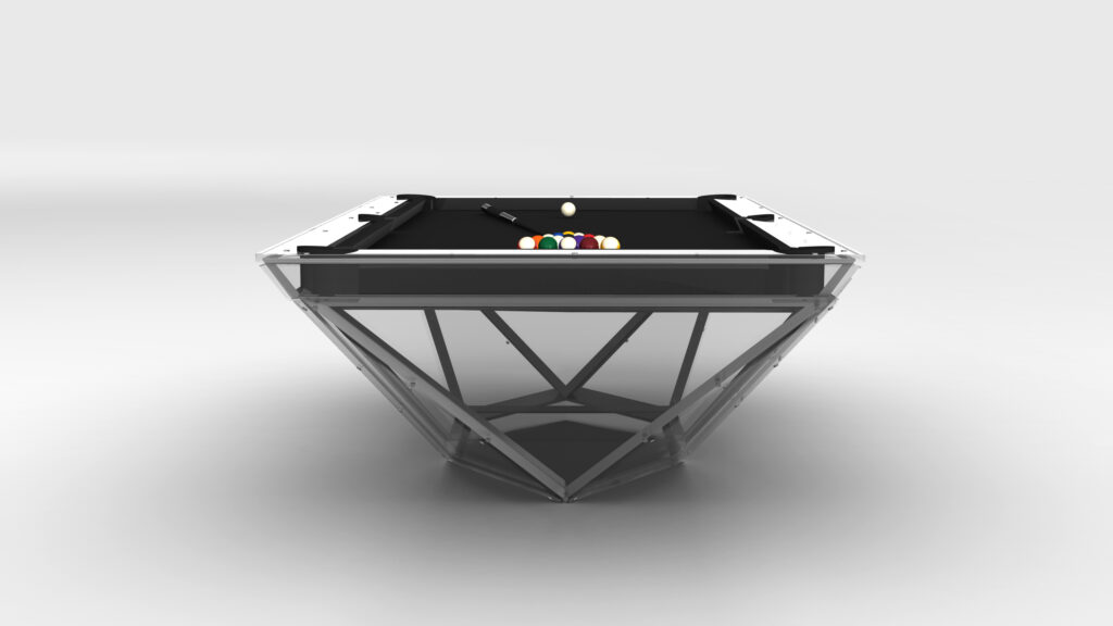 The Stealth Lucite Pool Table is a luxury game table featuring a transparent geometric base and sleek black surface. Vibrant balls adorn the table, set against a minimalist monochromatic backdrop that enhances its sophisticated allure.
