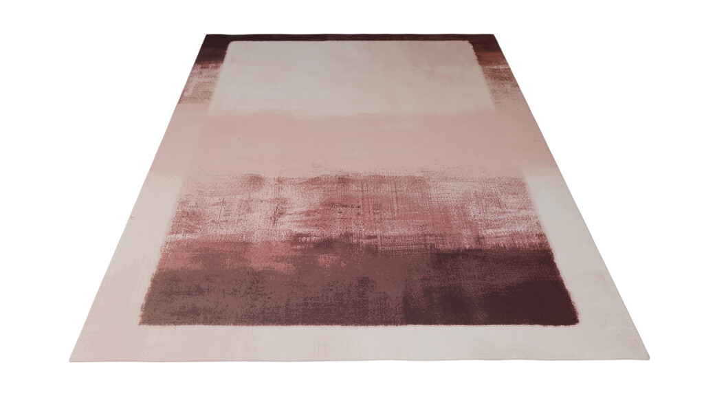 The Scoppia Rug is a rectangular area rug with an abstract gradient design, blending cream, blush pink, and burgundy shades from top to bottom.