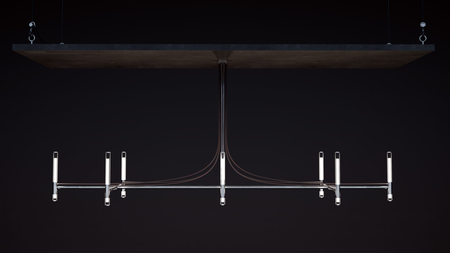 A modern chandelier with eight vertical tubes and visible wiring hangs above the Cena Dining Table, suspended by cables. The fixture has a sleek metallic finish and is set against a dark background.