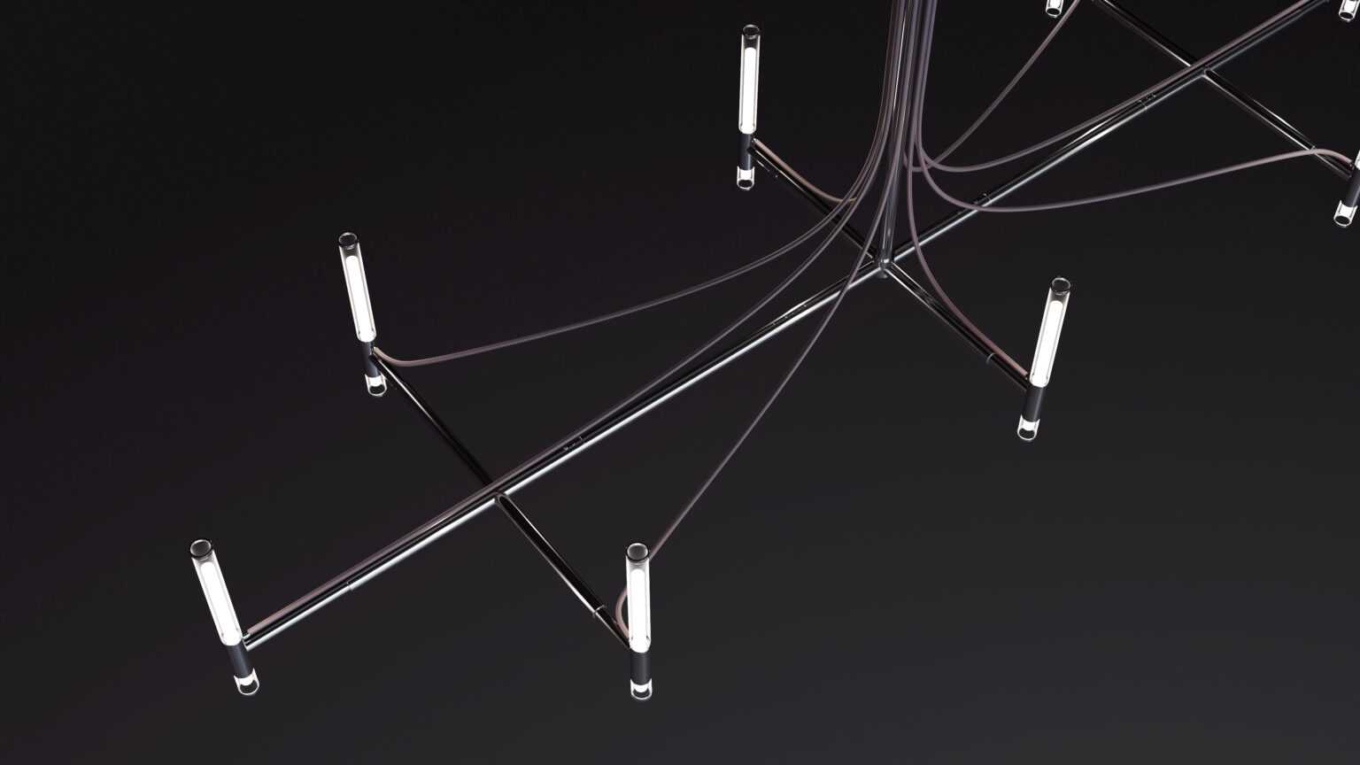 A striking geometric ceiling light with intersecting metal rods and cylindrical LED lights, suspended by thin cables above the Cena Dining Table, creates a bold abstract look against a dark background.