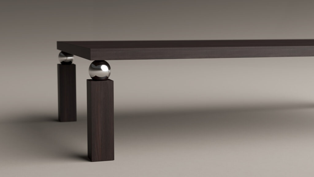 The Cena Dining Table boasts a modern look with a dark wood top and legs, highlighted by a shiny metallic sphere between the tabletop and square leg base, all set against a neutral background.