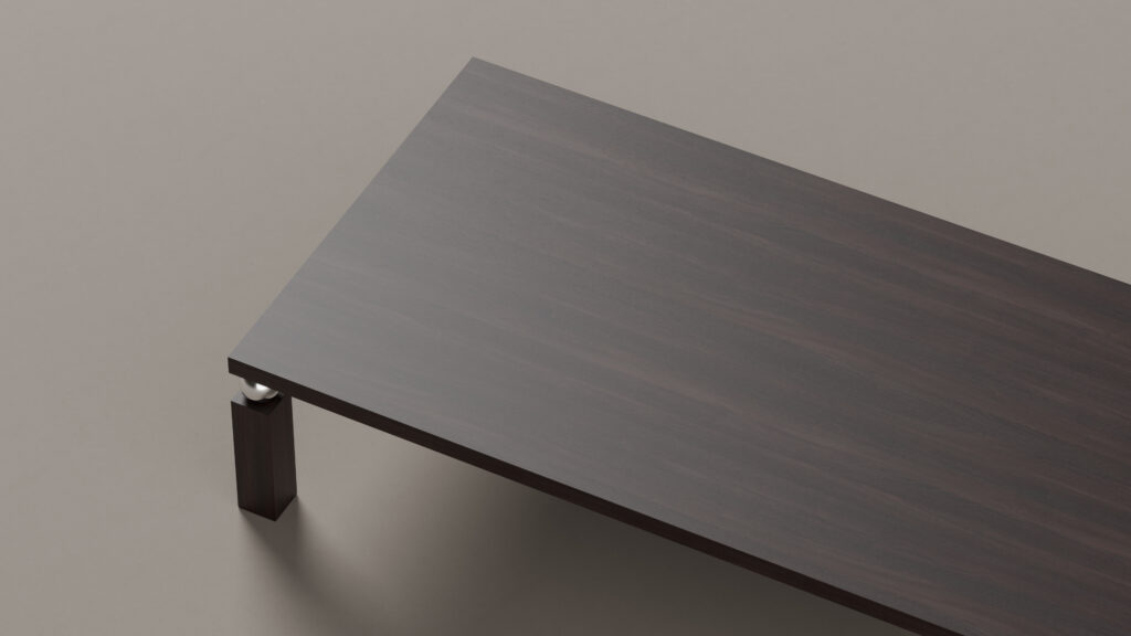 The Cena Dining Table, featuring a dark wooden finish, is pictured from an angled top view against a plain light background, showing only two legs and part of its tabletop.