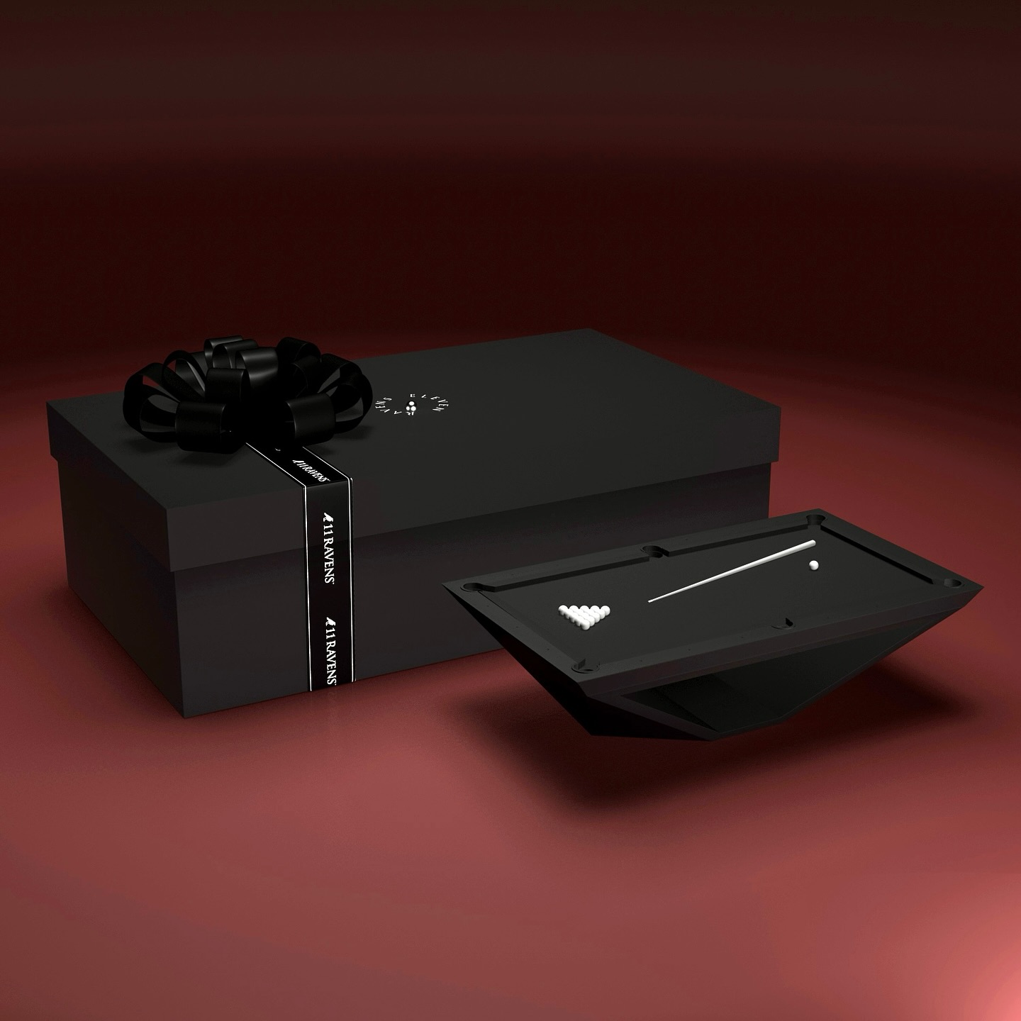 A sleek black gift box with a black bow sits on a dark surface. Next to it is an open black jewelry case displaying a delicate necklace and earrings, both featuring small white stones.