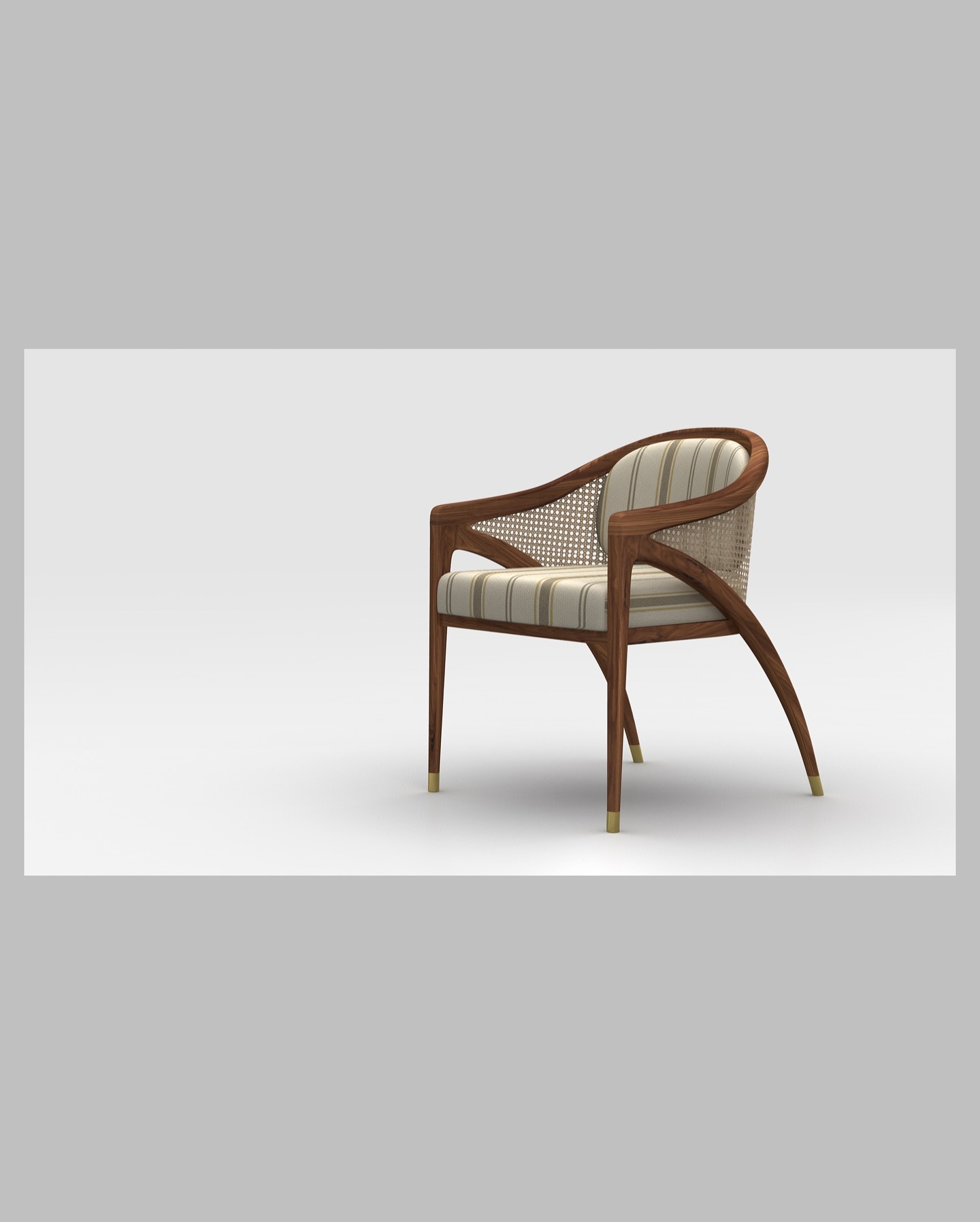 A modern armchair with a curved wooden frame, woven backrest, and striped beige cushion, set against a plain light background. The chair has slim legs with gold tips.