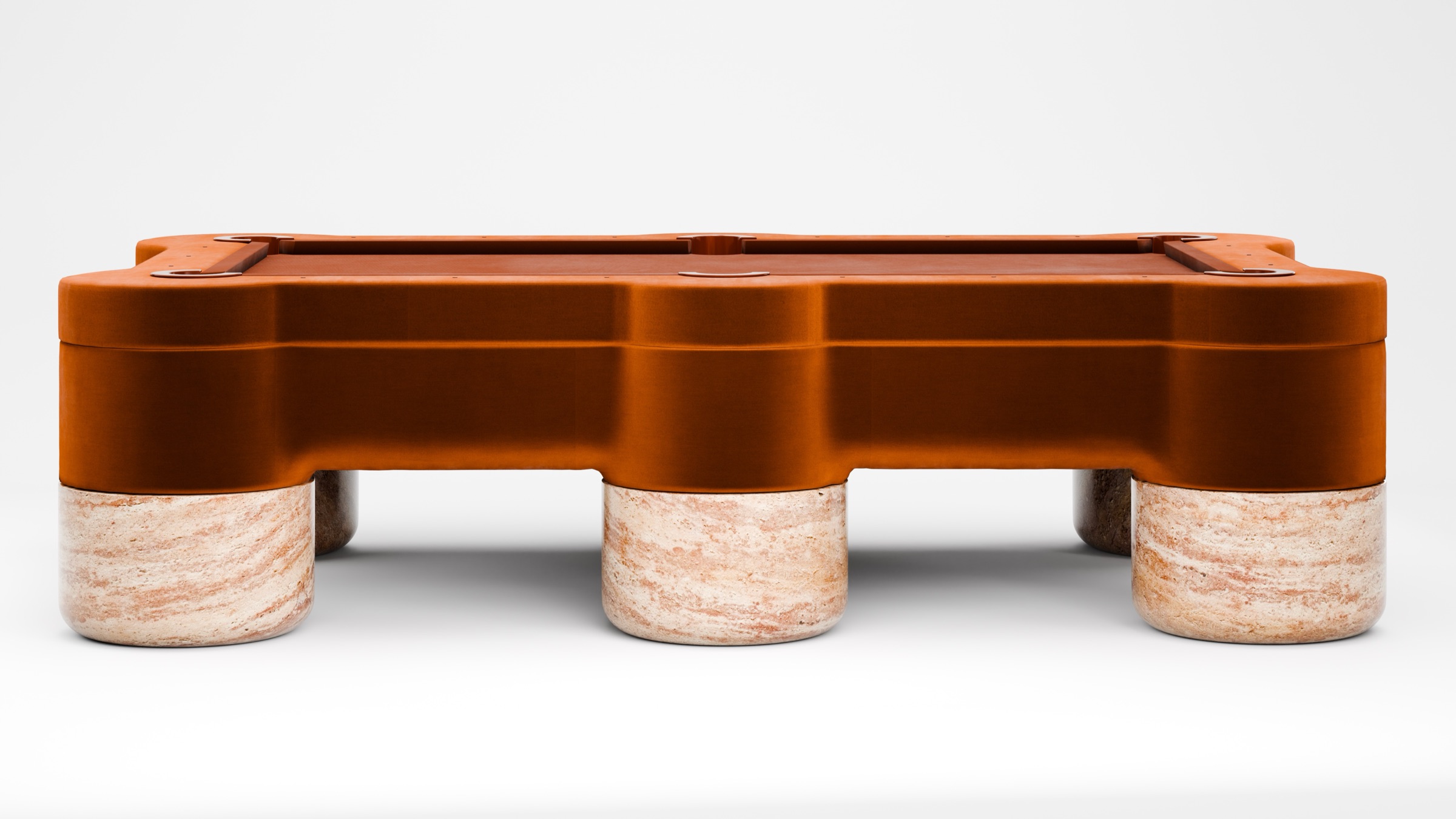 The Marc Ange Pool Table is a modern rectangular table with a smooth rust-colored top and thick cylindrical marble legs, shown against a plain white background.