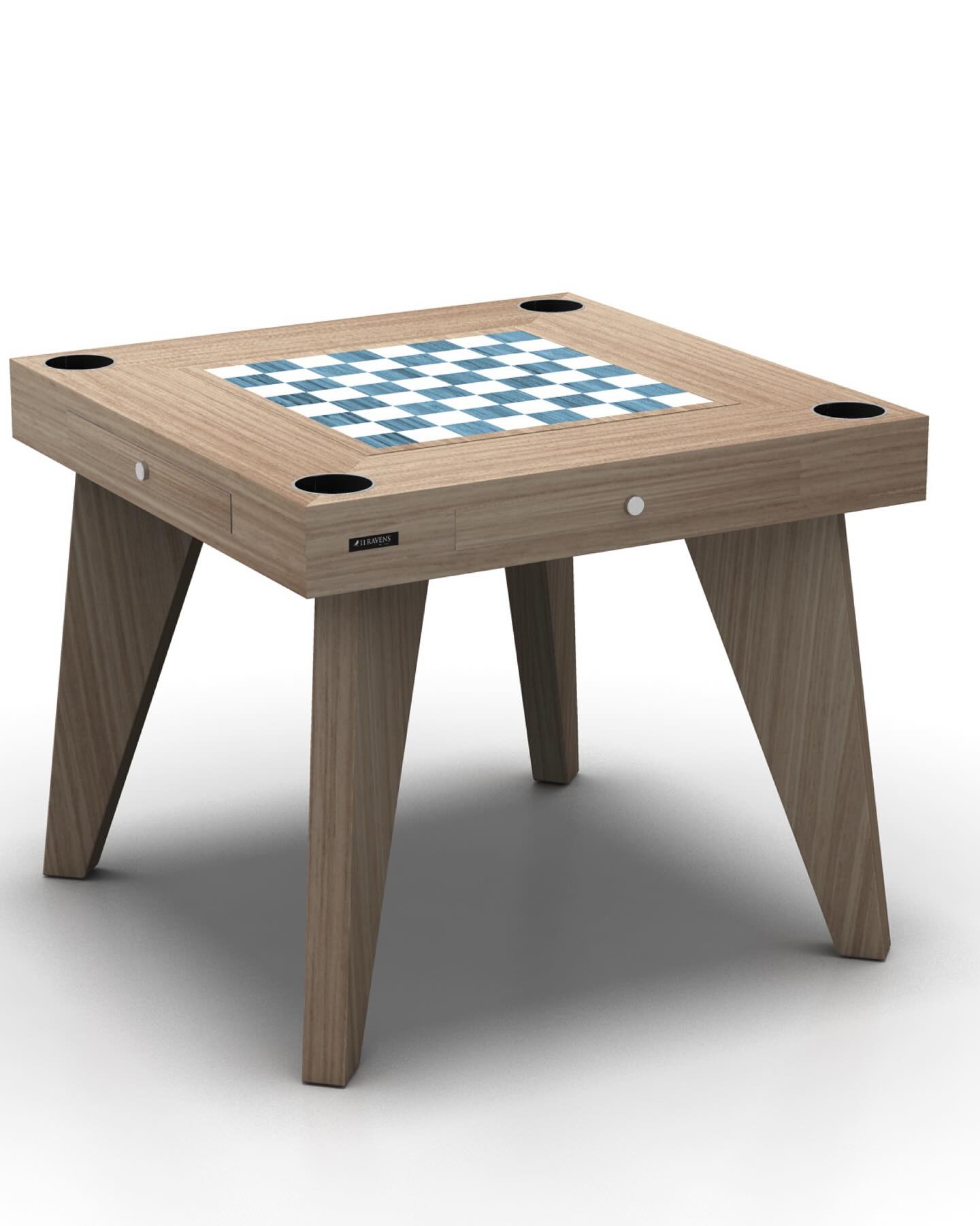 A modern wooden table with angled legs, featuring a blue and white chessboard pattern in the center and four circular cup holders at each corner.