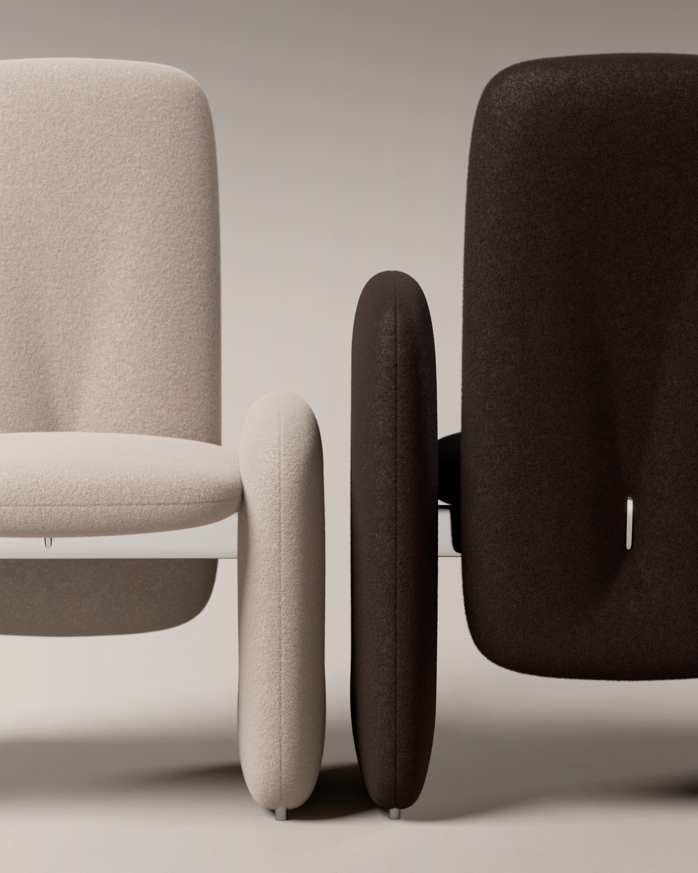 Two modern, minimalist armchairs are shown side by side—a light beige chair on the left and a dark brown chair on the right—against a plain, neutral background.