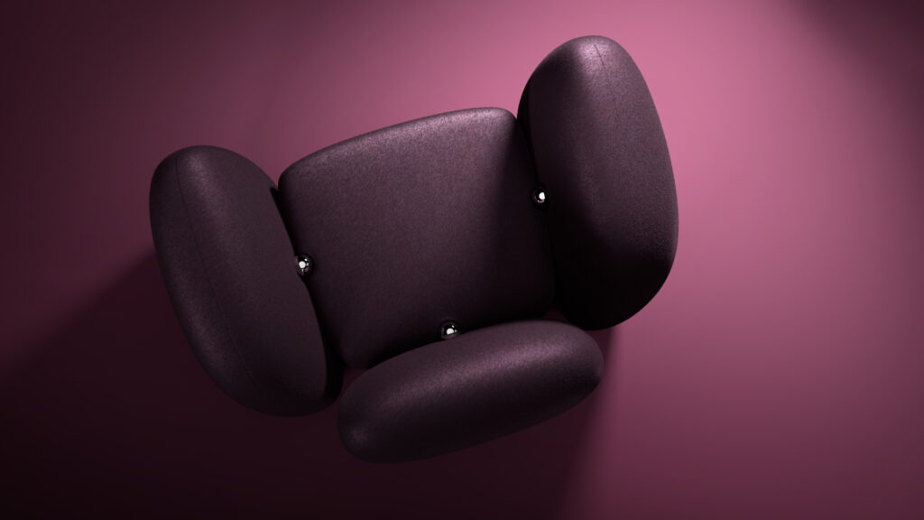 A modern, purple upholstered chair with rounded cushions viewed from above, placed against a matching purple background with soft lighting and shadows.