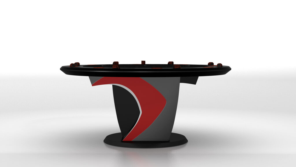 A modern, circular black table with a geometric, angular pedestal base featuring bold red and gray accents, set on a plain white background.