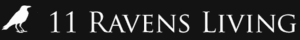 A white silhouette of a raven stands to the left of the text 11 Ravens Living, evoking a refined living room vibe with elegant white letters on a black background.