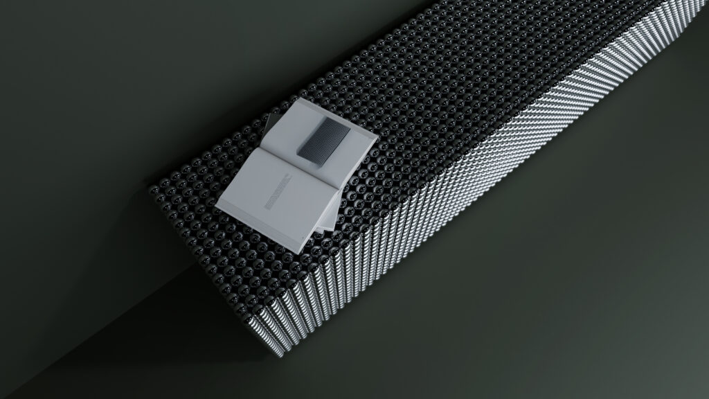 A minimalist black bench with a textured, cylindrical pattern sits against a dark wall. An open book and a closed notebook rest on top of the bench, creating a modern, sophisticated scene.