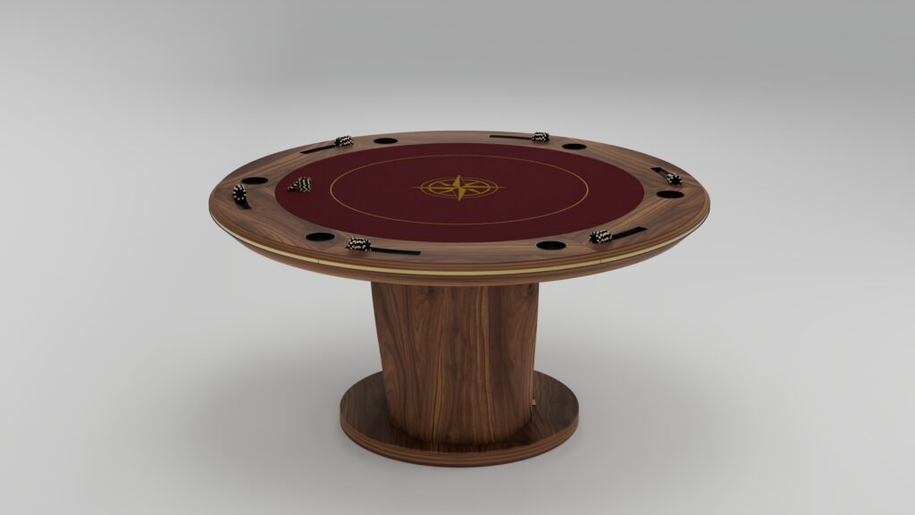 A handcrafted round wooden poker table with a maroon playing surface, gold compass design in the center, poker chips around the edge, and cup holders, supported by a single pedestal base—a true statement of luxury game tables.