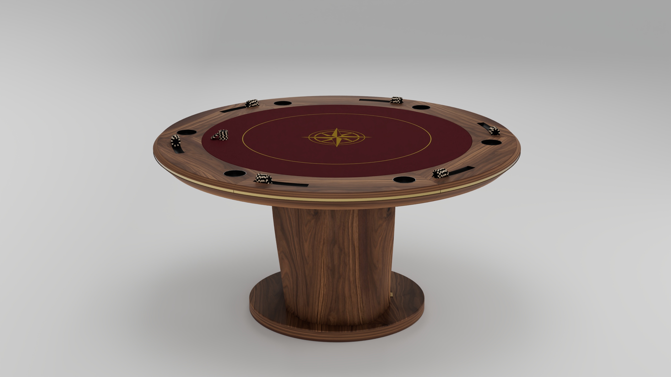 A handcrafted round wooden poker table with a maroon playing surface, gold compass design in the center, poker chips around the edge, and cup holders, supported by a single pedestal base—a true statement of luxury game tables.