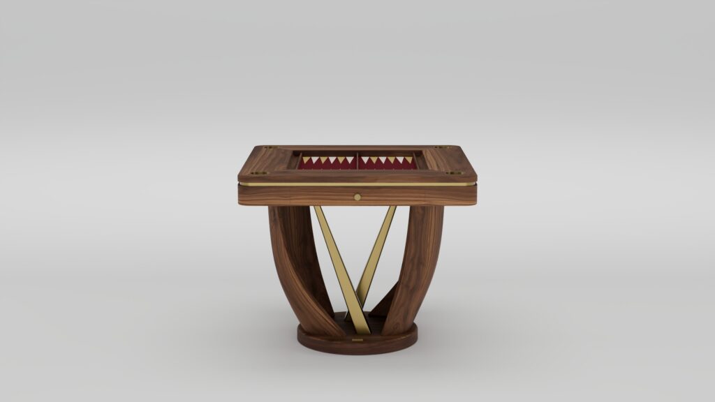 A modern handcrafted wooden table with brass accents, featuring a square top and geometric base. The tabletop has an inset area with red and white triangular patterns, resembling luxury game tables. The background is plain light gray.
